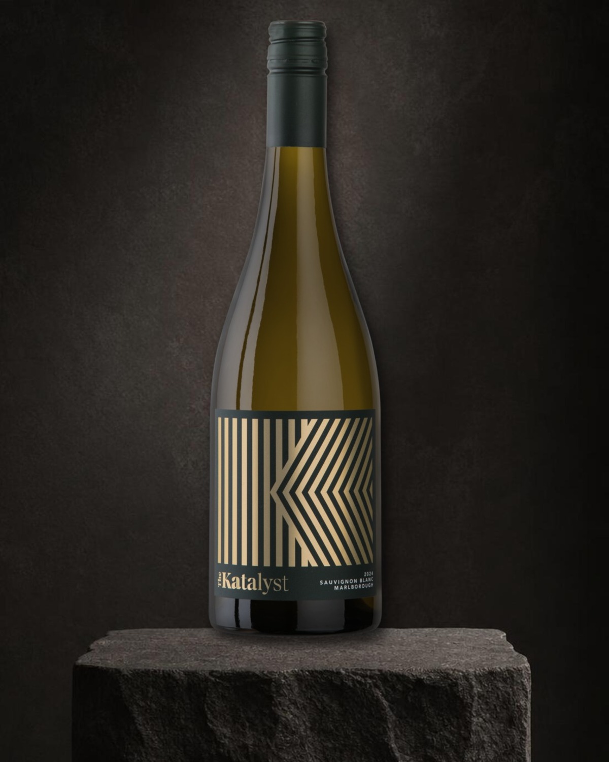 The Katalyst Sauvignon Blanc bottle on a charcoal limestone pedestal
